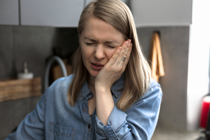 Young Woman Having Toothache At Home Trigeminal Neuralgia<br />